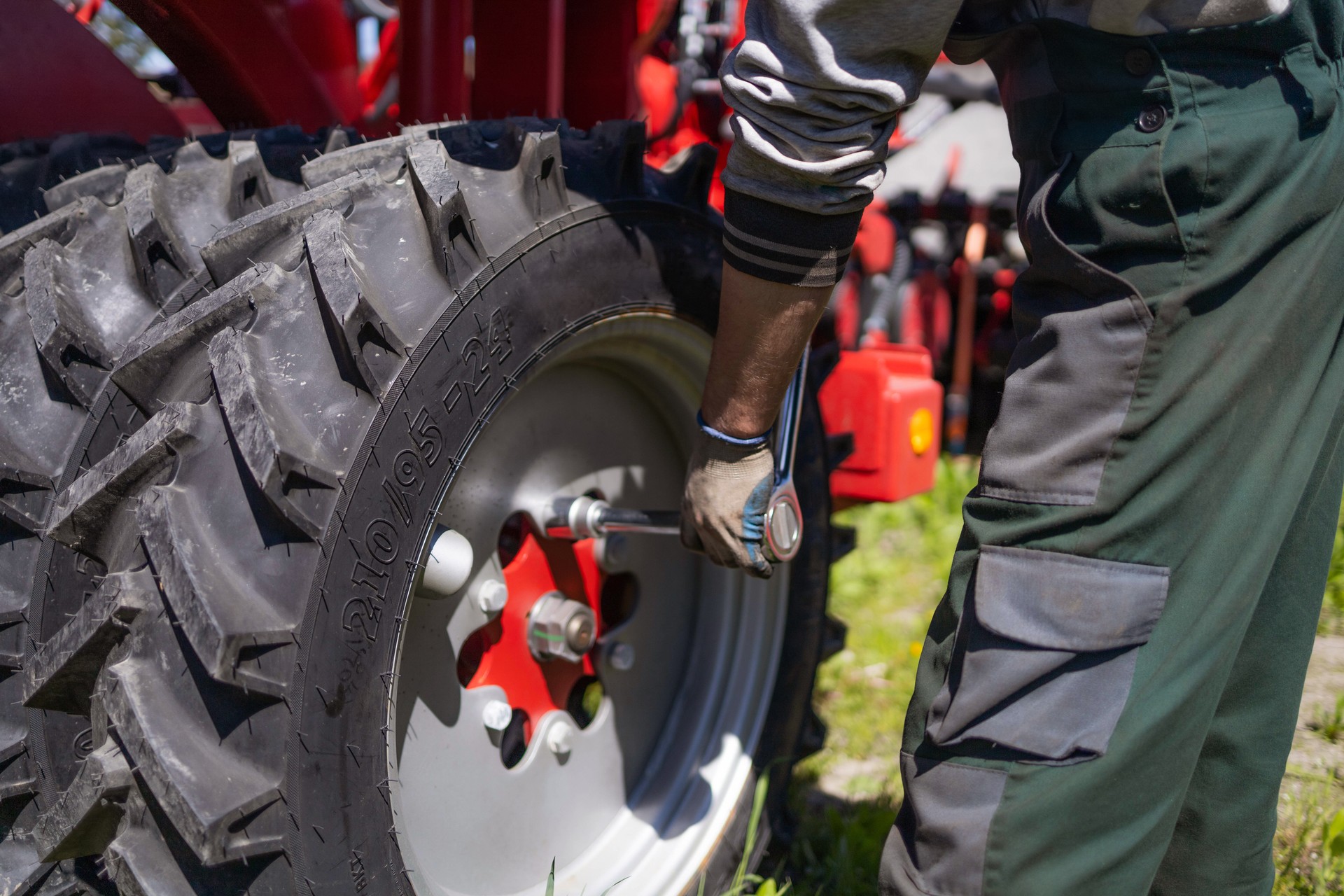 Mechanic repairing agricultural machinery